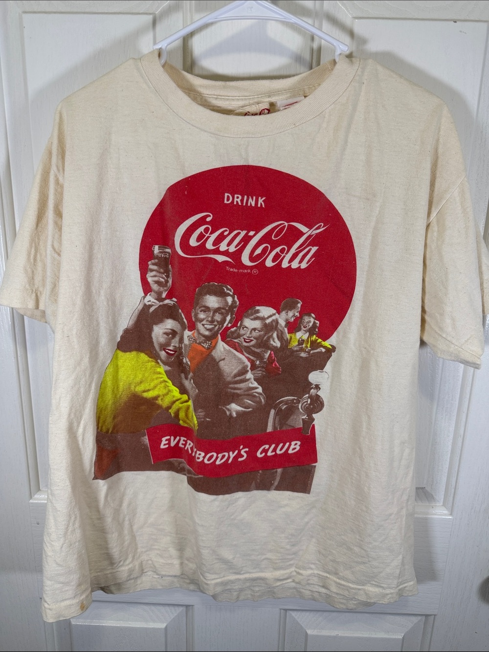 Coca Cola Cream Short Sleeve Tee with Red Logo and Yellow Accent